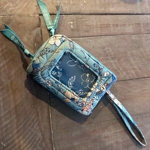 Vera Bradley wrist wallet.  Two compartments with photo ID.